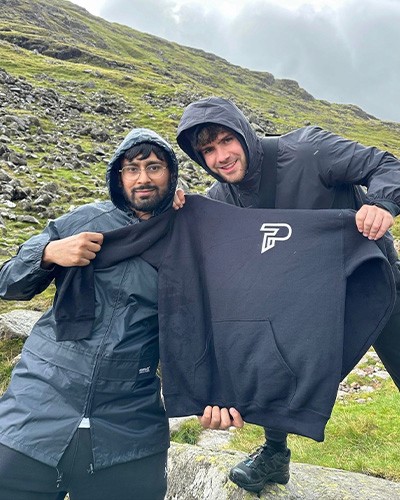 Up a mountain in the P hoodie